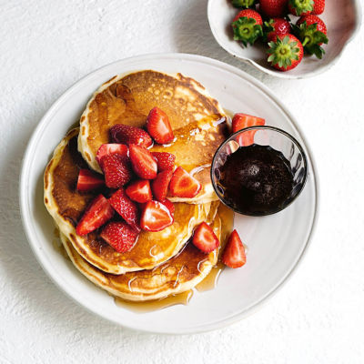 Basic Pancakes With Strawberries & Maple Syrup