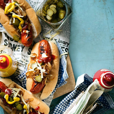 Kransky Dogs With Sauteed Onion And Swiss Cheese