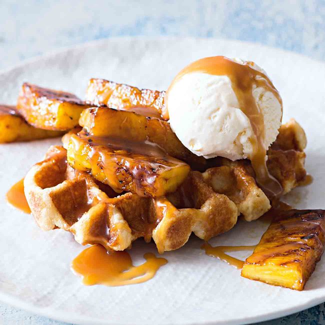 Chargrilled Pineapple with Waffles & Hot Butter Rum Sauce