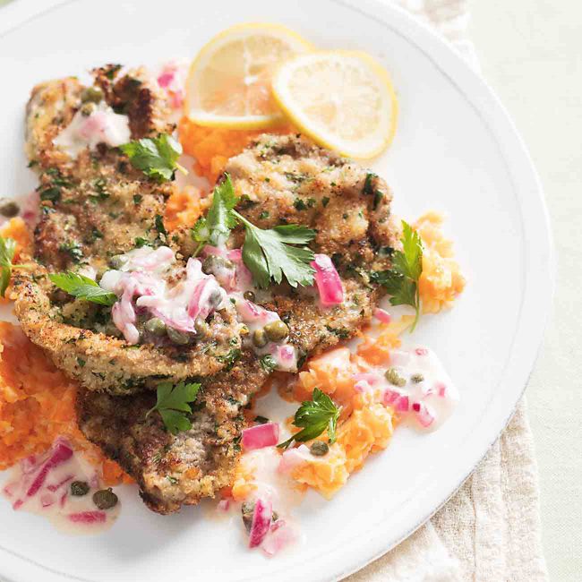 Veal schnitzel with lemon caper sauce, carrot & parsnip mash