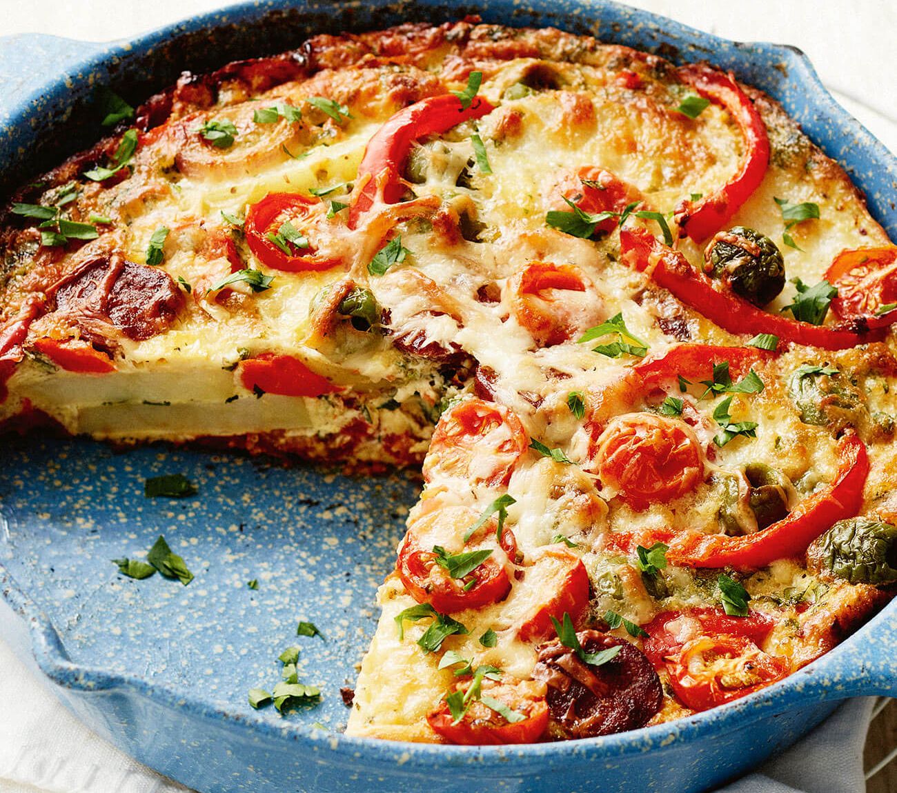 https://foodhub.scene7.com/is/image/woolworthsltdprod/1710-tortilla-espanola:Mobile-1300x1150