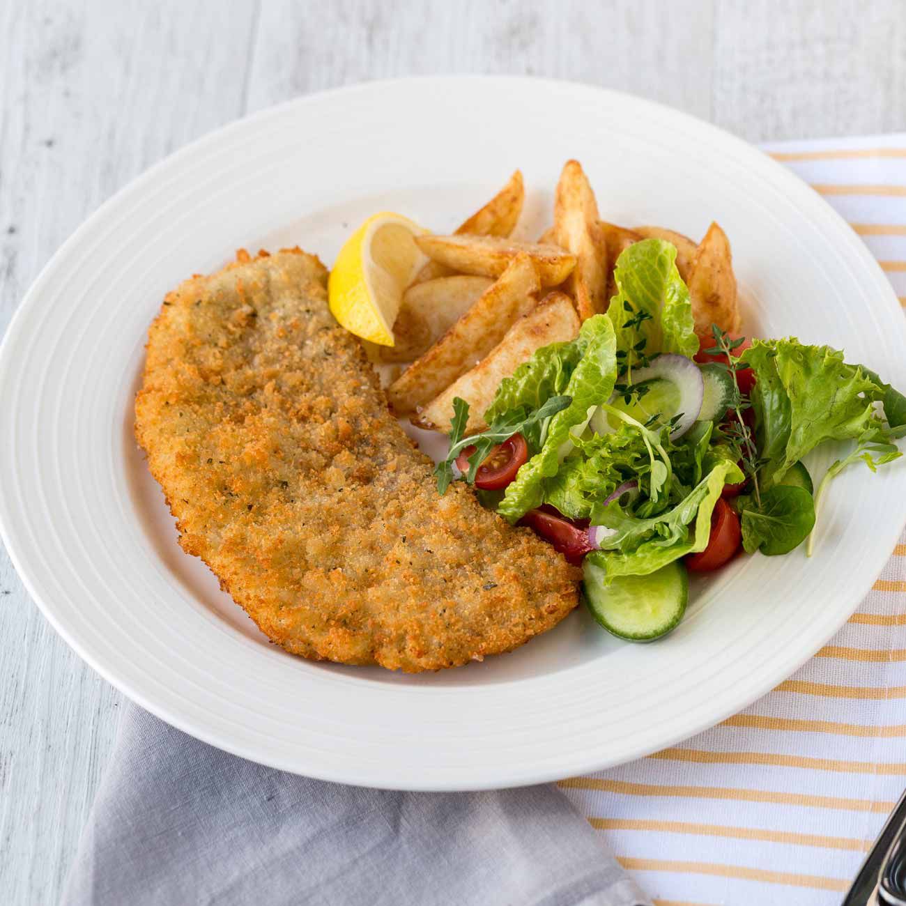 Pork Schnitzel With Chips & Salad Recipe | Woolworths