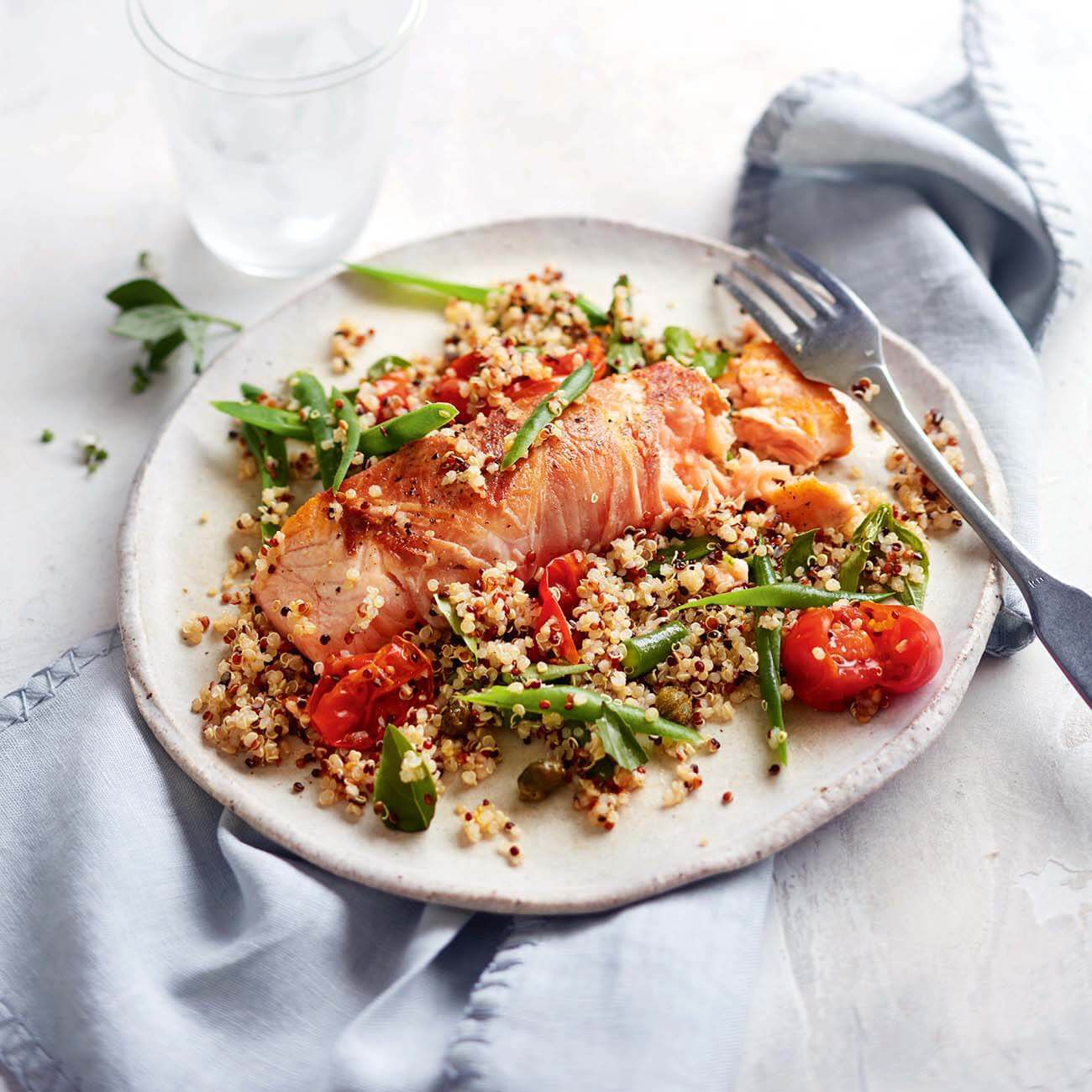 Prosciutto-wrapped salmon with quinoa