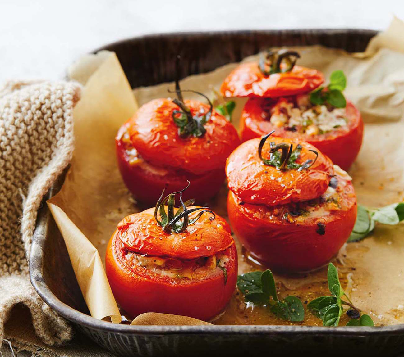 https://foodhub.scene7.com/is/image/woolworthsltdprod/1908-stuffed-tomatoes-with-cheese-and-olives:Mobile-1300x1150