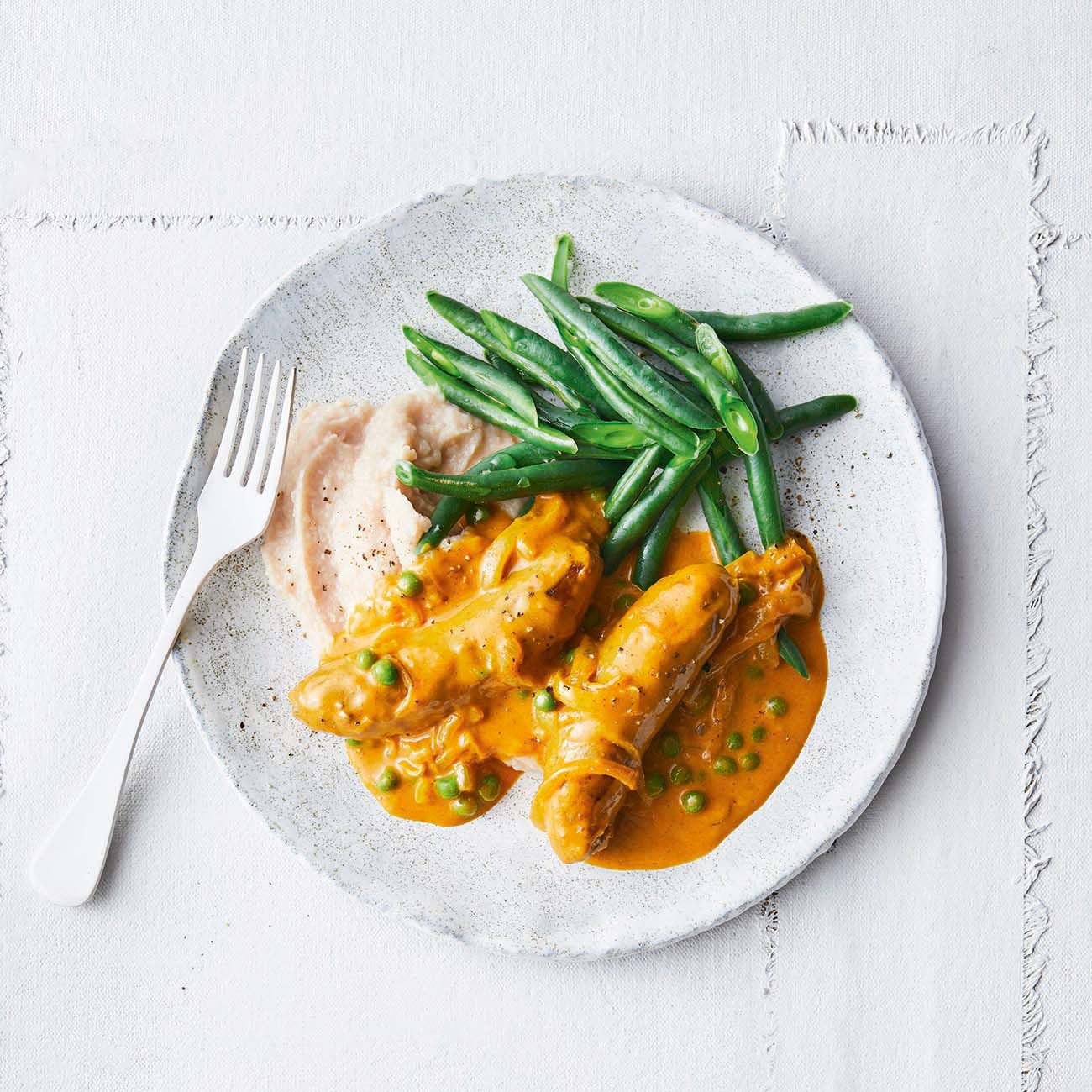 Curried Sausages with White Bean Mash