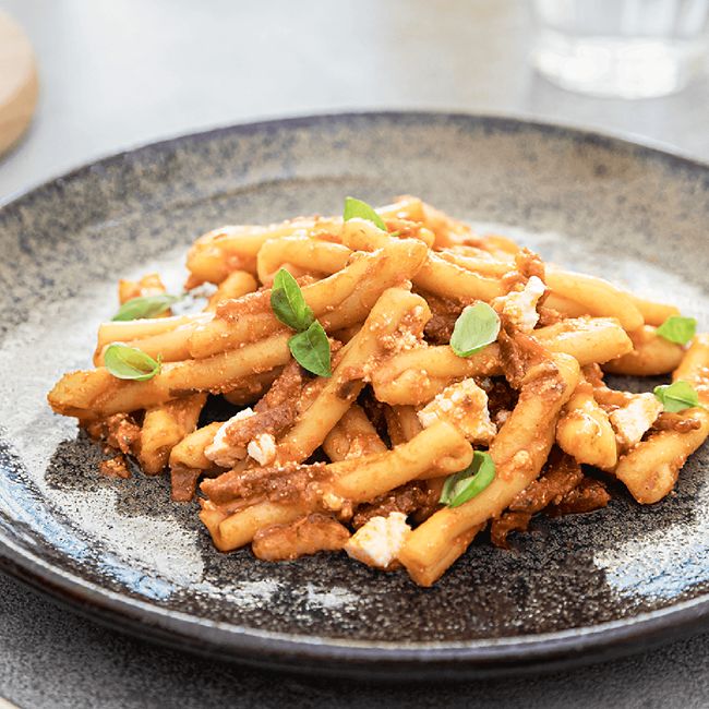 Casarecce With Spicy Salami, Saffron And Ricotta In Napoletana Sauce