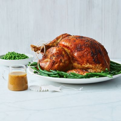 Herb And Garlic Butter Roast Turkey With Gravy