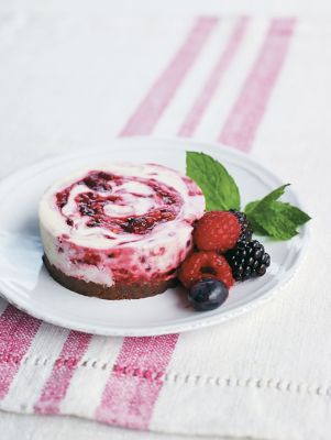 Individual Mixed Berry Swirl Cheesecakes