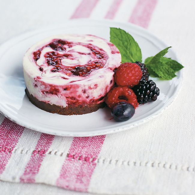 Individual Mixed Berry Swirl Cheesecakes