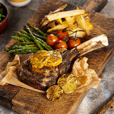 Ribeye Steak With Soy Butter, Sticky Asparagus And Hand Cut Chips