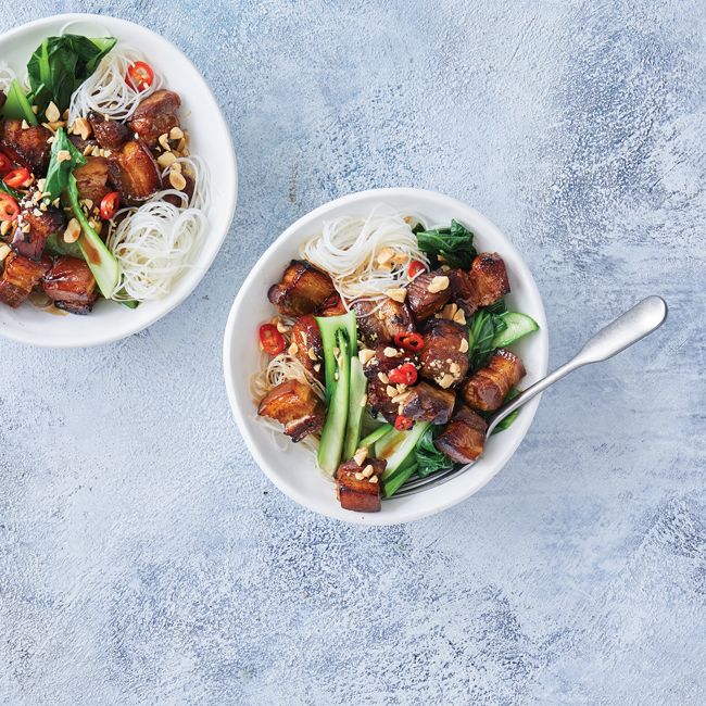 Caramel pork belly with choy sum and noodles