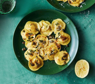 Cheesy ravioli with lemon butter and capers