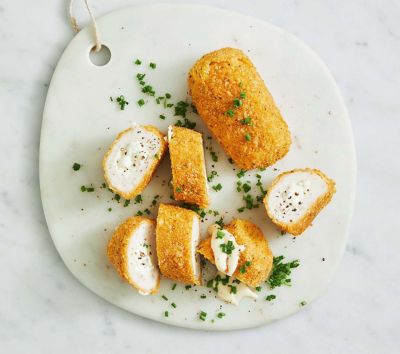 Garlic chicken Kiev with cheesy sauce