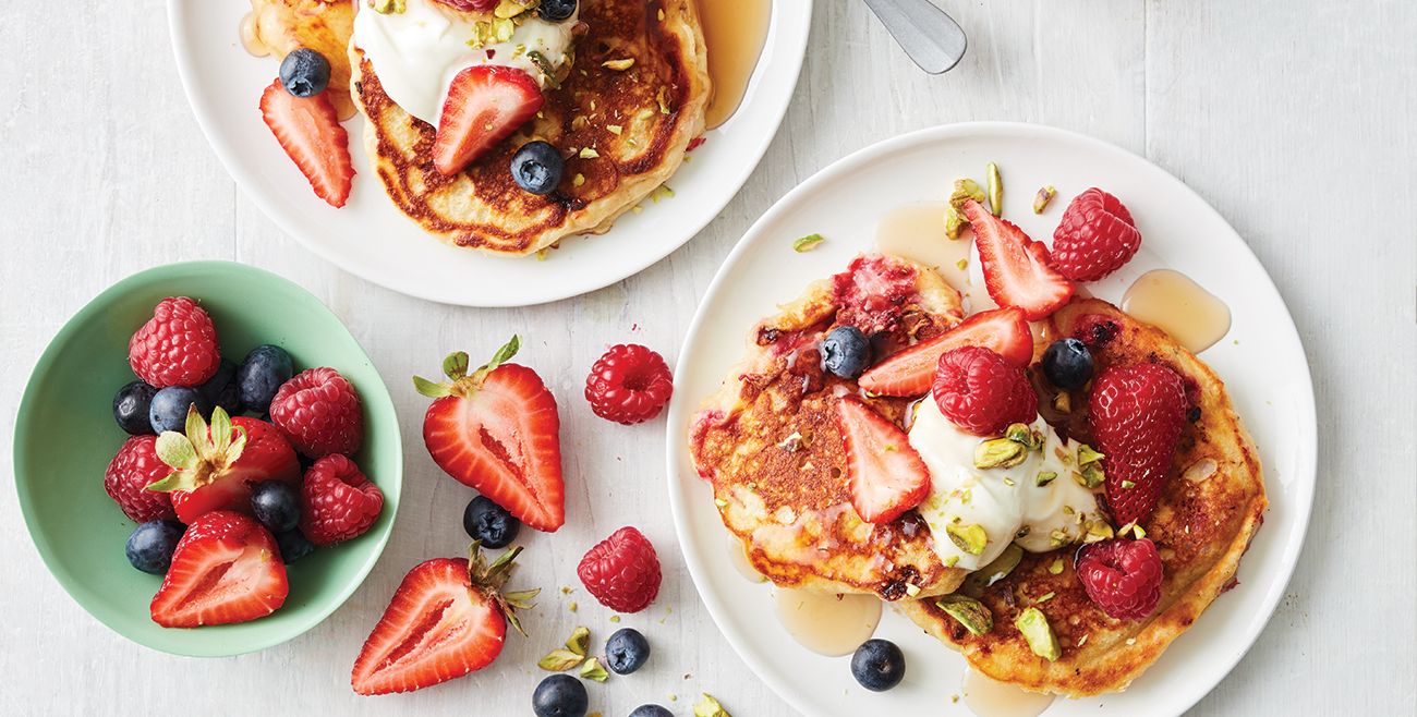 https://foodhub.scene7.com/is/image/woolworthsltdprod/2112-fluffy-raspberry-and-yoghurt-pancakes%3ADesktop-1300x658