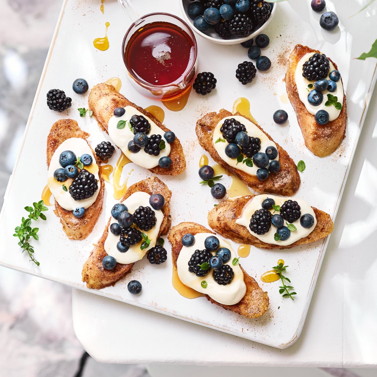 Eggnog french toast with maple butter and berries