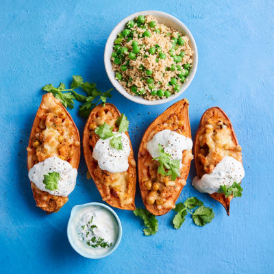 Chickpea-stuffed Sweet Potatoes with Pea Couscous