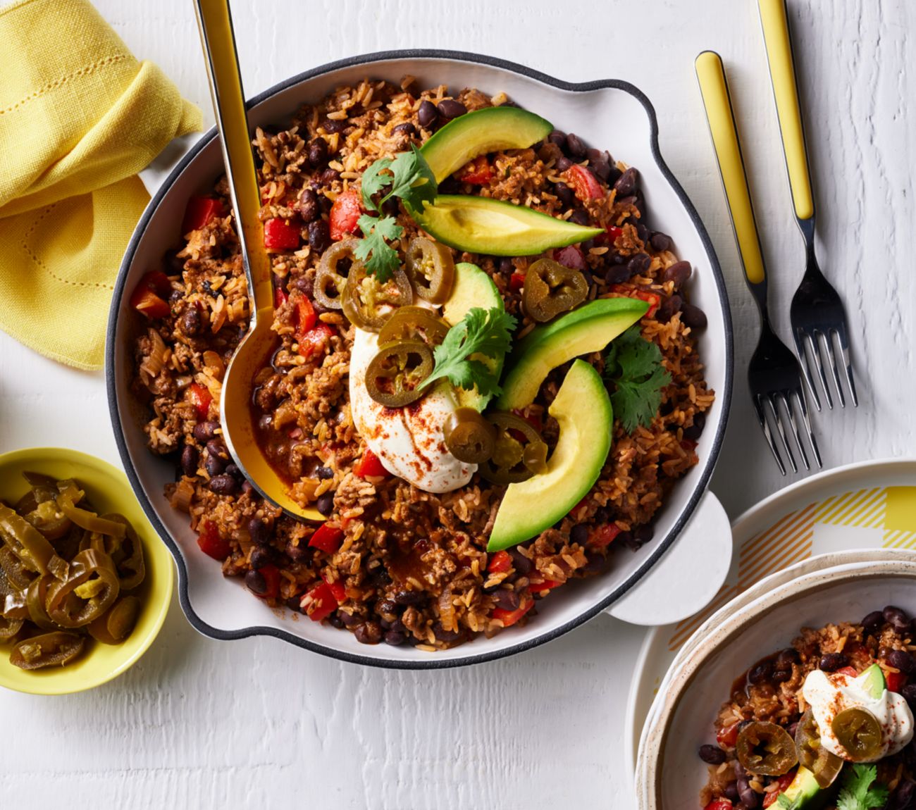 https://foodhub.scene7.com/is/image/woolworthsltdprod/2306-Mexican-style-chilli-and-garlic-rice:Mobile-1300x1150