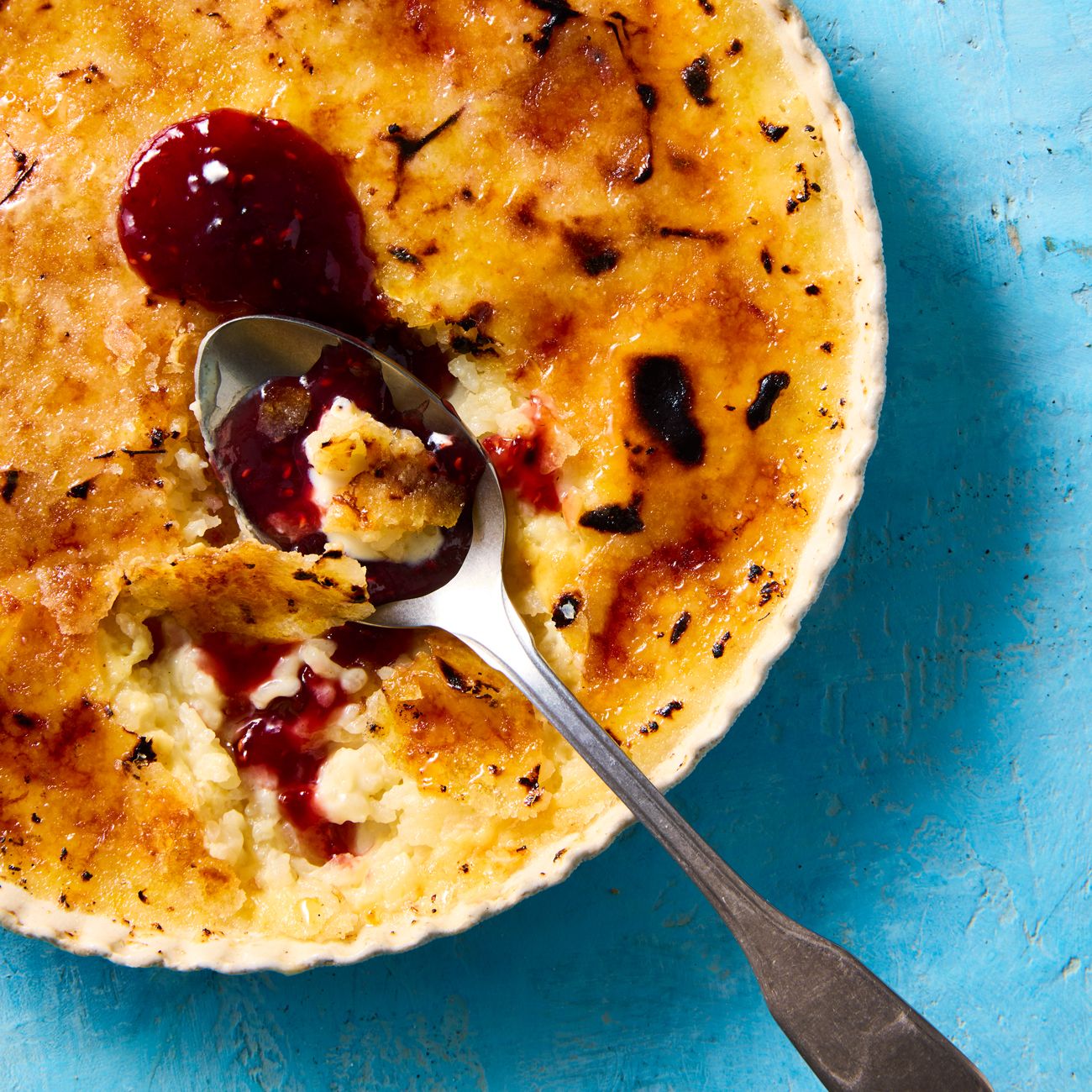 baked rice pudding with raspberry jam