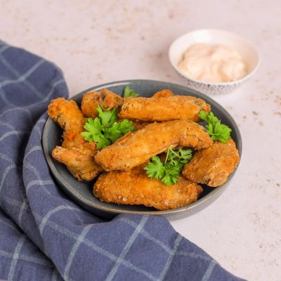 Buttermilk Chicken Wings in A Floured Spiced Crust.