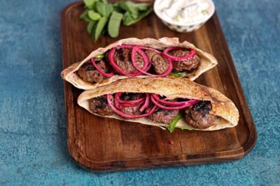 Lamb Kofta Kebab with Mint Yoghurt & Pickled Onions.