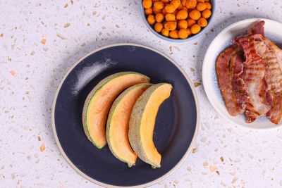 Melon with Chilli Peanuts & Streaky Bacon.