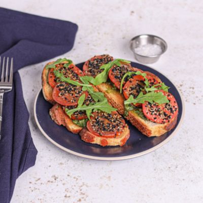 Sesame Coated Roma Tomato Sandwich & Rocket.