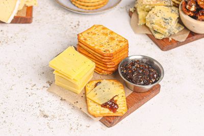 Crackers with Onion Jam & Cheddar.