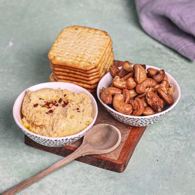 Crackers with Chilli Hummus & Roast Cashew Nuts.