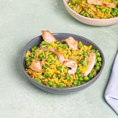 Chicken Fried Rice Cooked in Coconut Oil with Mustard, Cumin & Peas.