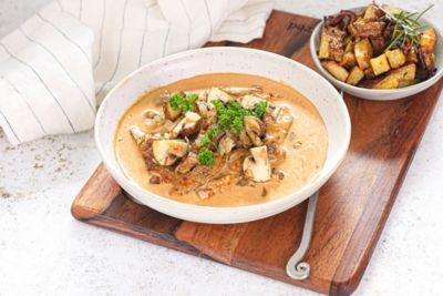 Beef Stroganoff with Cubed Potatoes in Garlic Butter.