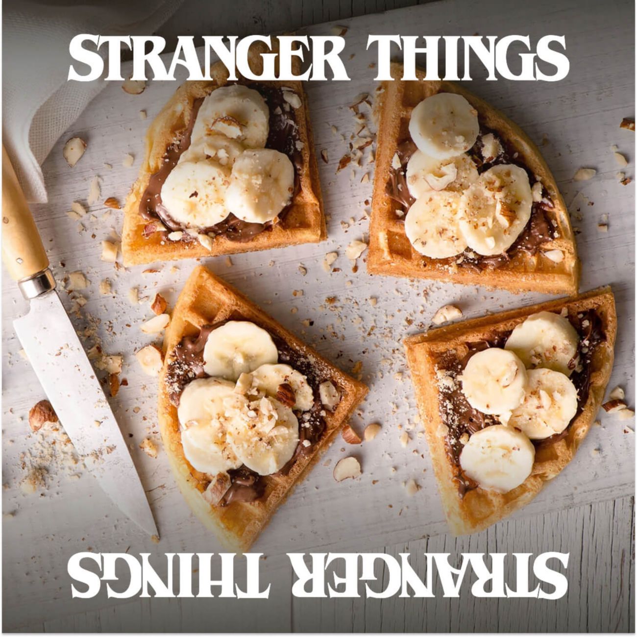 Waffle quarters topped with chocolate spread, bananas, and nuts, with "STRANGER THINGS" text mirrored.