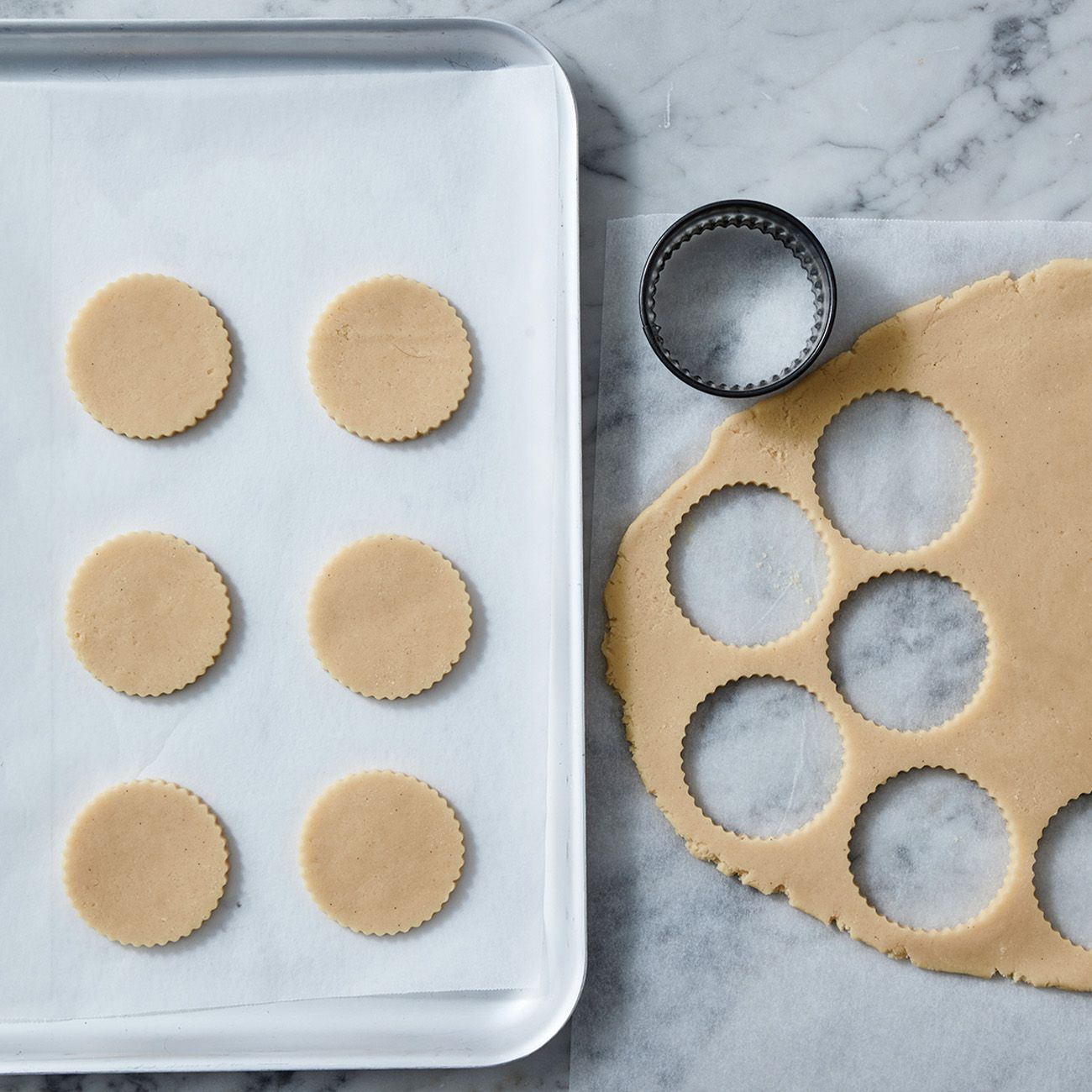 Sugar cookies being cut out