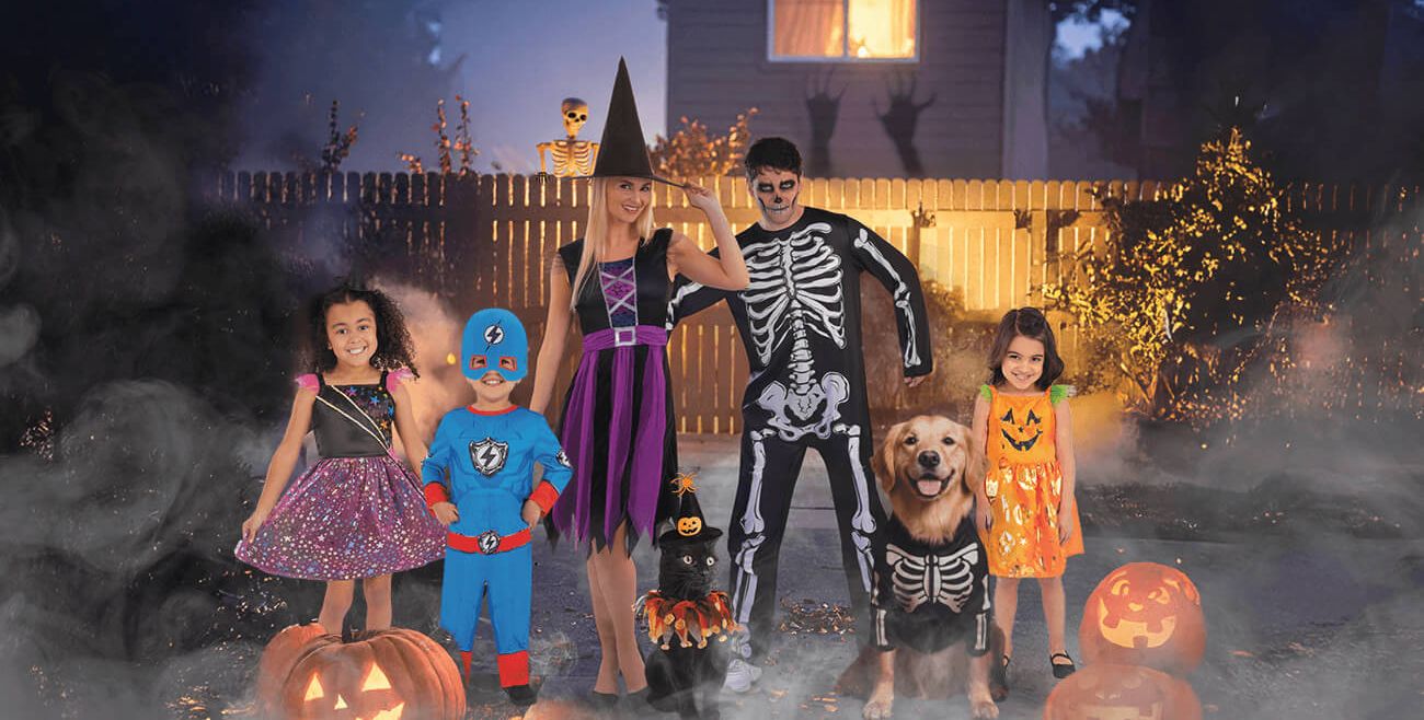 Family wearing Halloween costumes