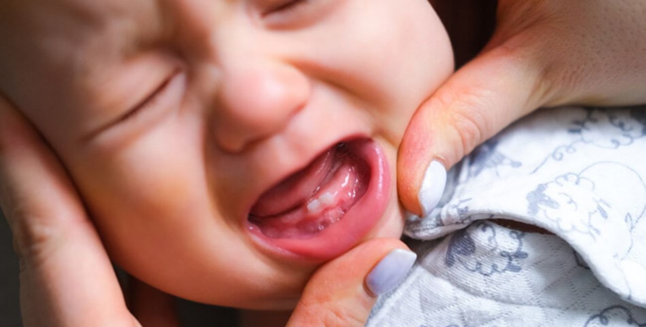 The visible distress of a teething baby