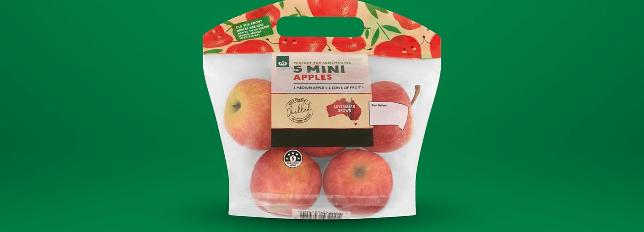 A bag of Woolworths 5 Mini Apples for lunchboxes. Australian grown and best stored chilled in the fridge.