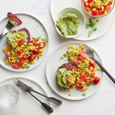 Beetroot patties with smashed avocado & corn salsa