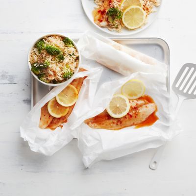 Baked fish parcels with broccoli rice