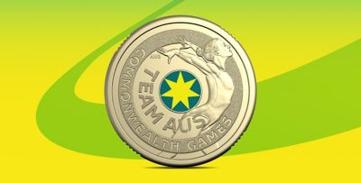 Woolworths Team AUS Commonwealth Games coin featuring an athlete and star on a green-yellow background.