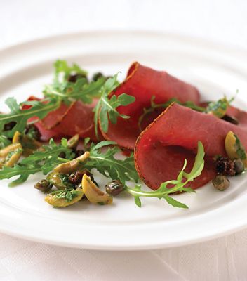 Sliced Beef & Rocket Salad With Green Olive & Raisin Salsa