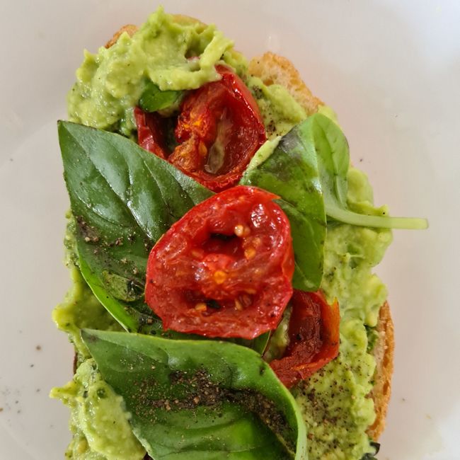 Avocado toast with pesto & roasted Roma tomatoes