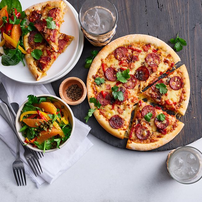 Salami & Smoked Leg Ham Pizza with Orange Salad