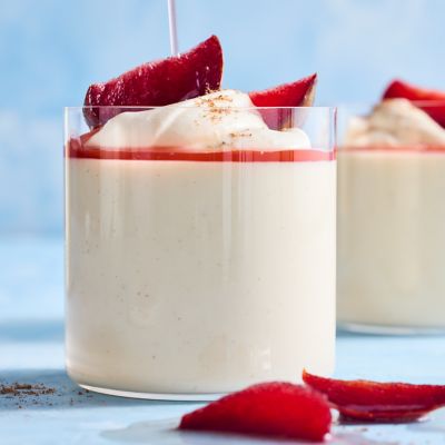 Eggnog Panna Cotta with Plums in Brandy Syrup