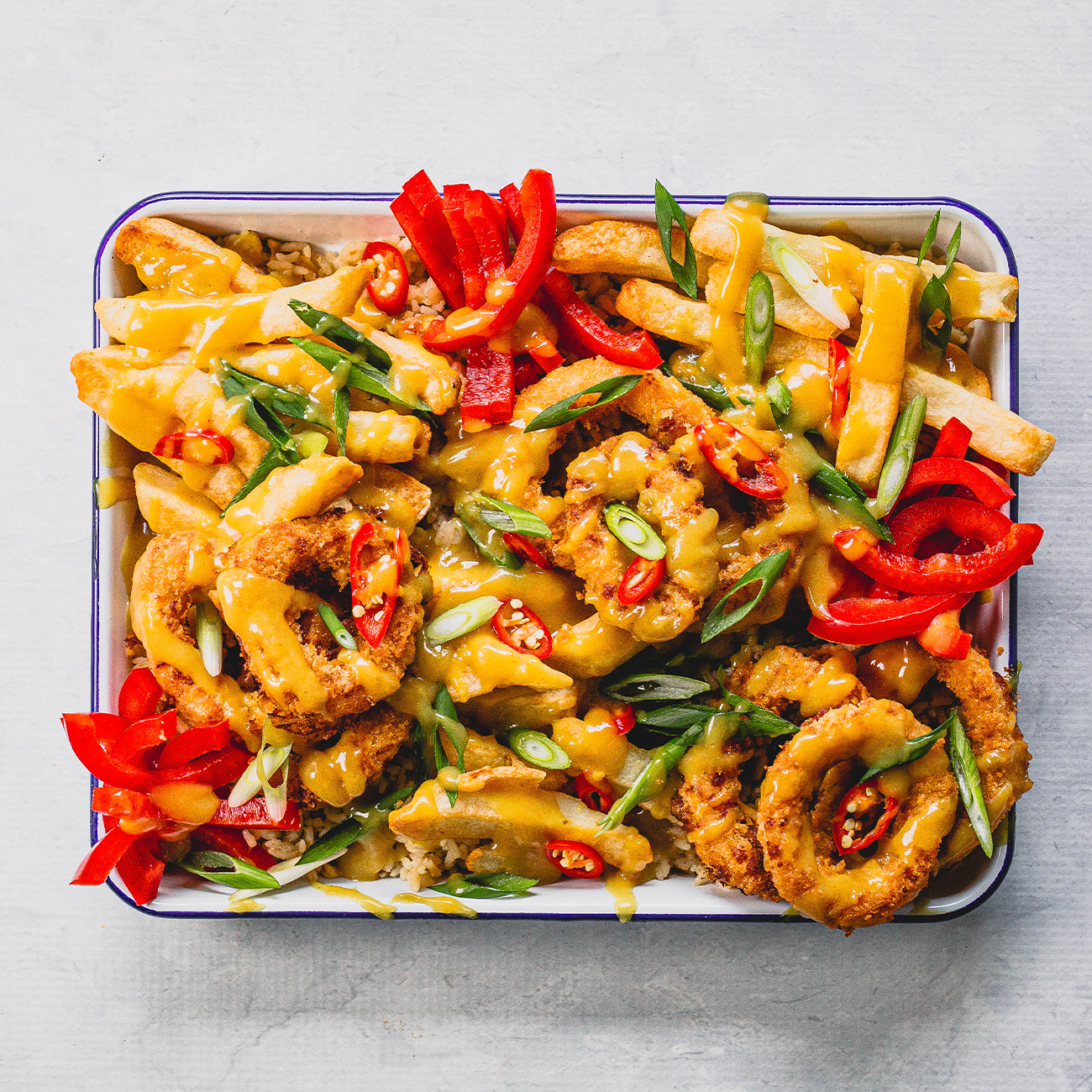 Crumbed Squid with Chips & Curry Sauce