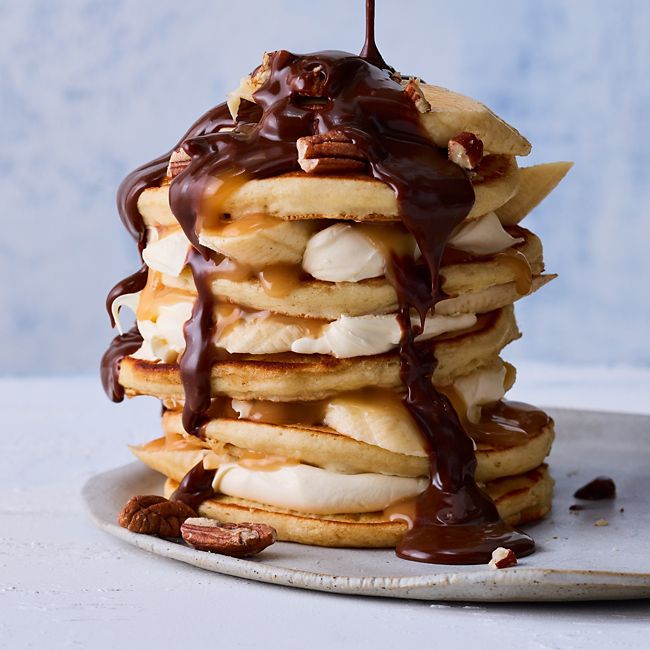 Vanilla Banana Pancakes with Caramel & Chocolate Topping