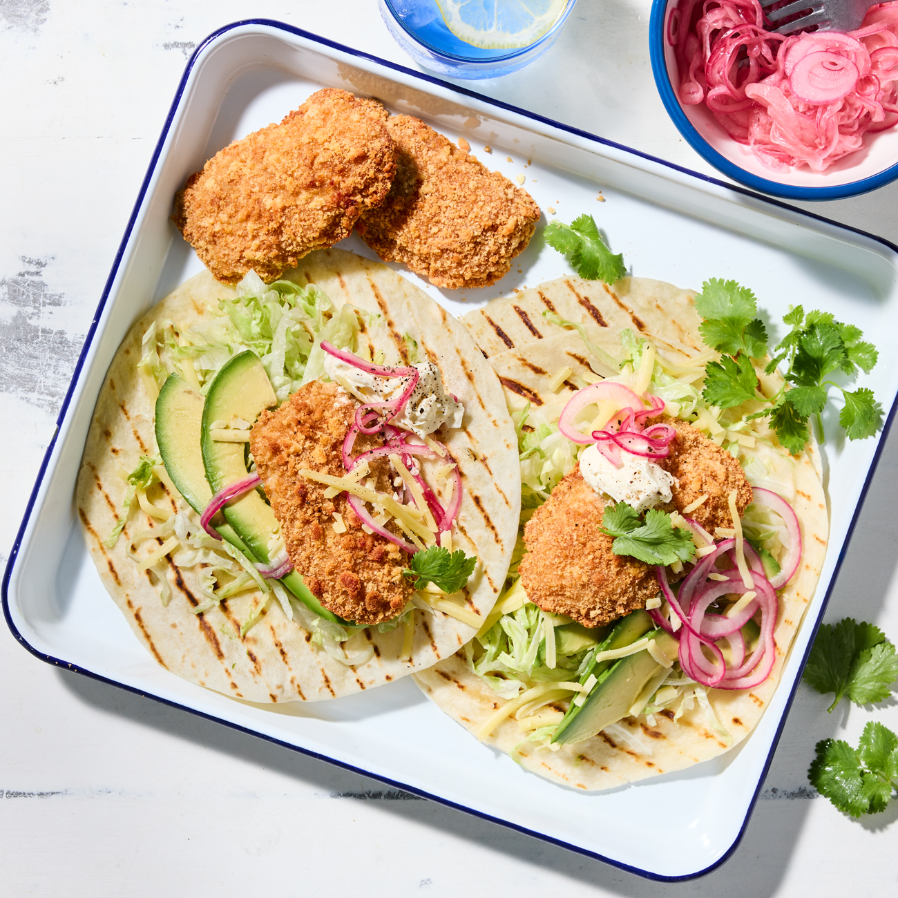 Fish tacos with pickled onion