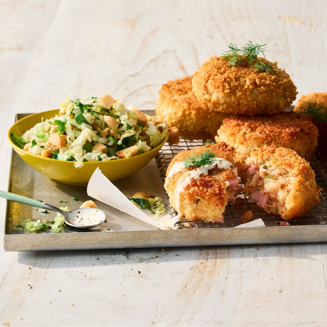 Salmon & bacon cakes with macadamia slaw