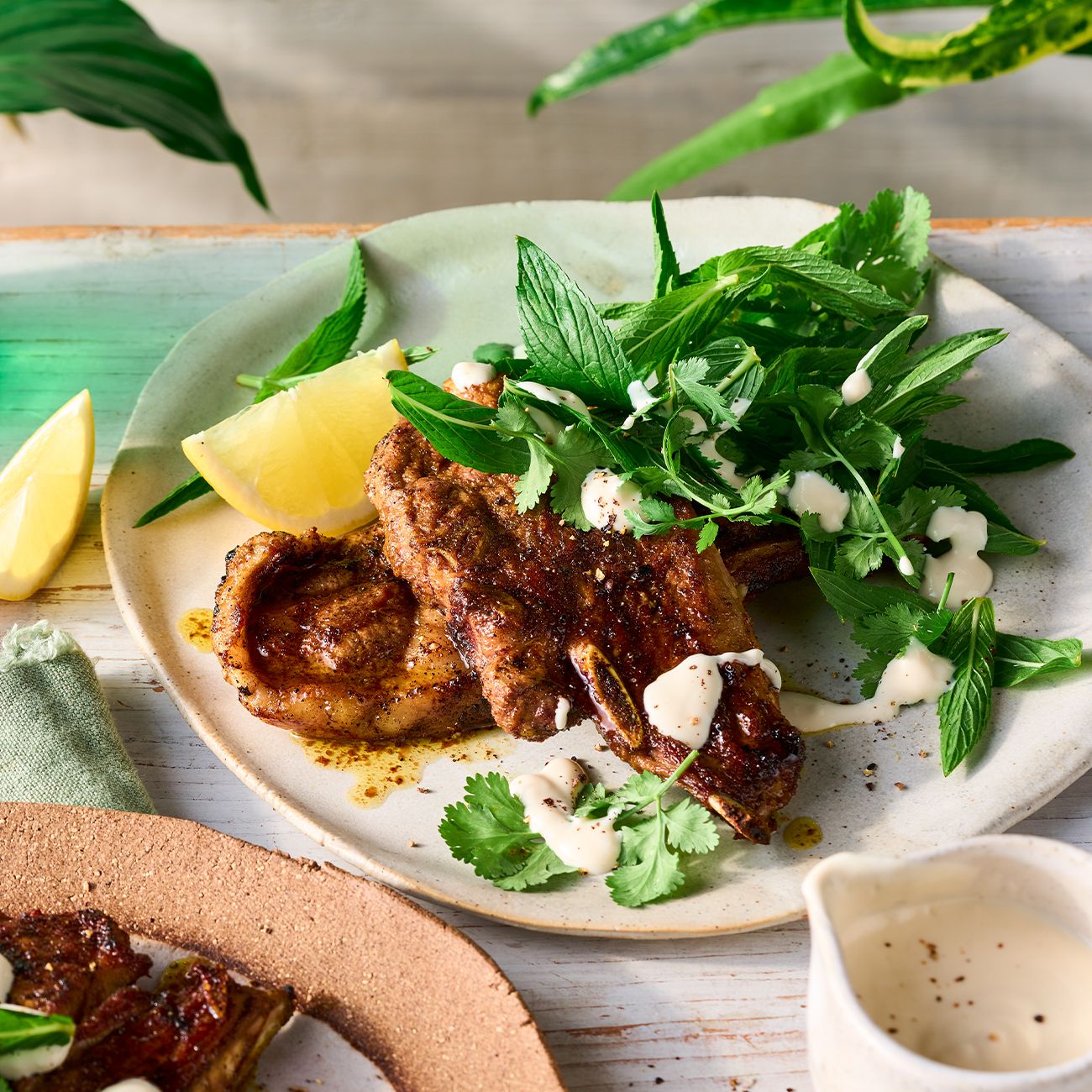 Spiced lamb with garlic lemon sauce