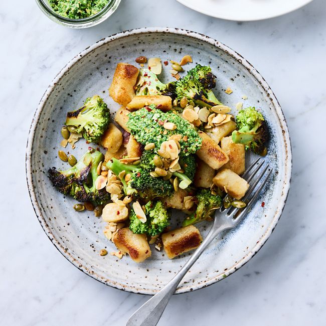 Pan-fried cauliflower gnocchi with pepitas & rocket pesto