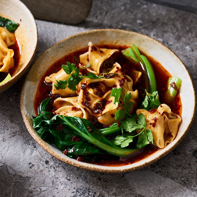 Chicken wontons in spicy chicken broth