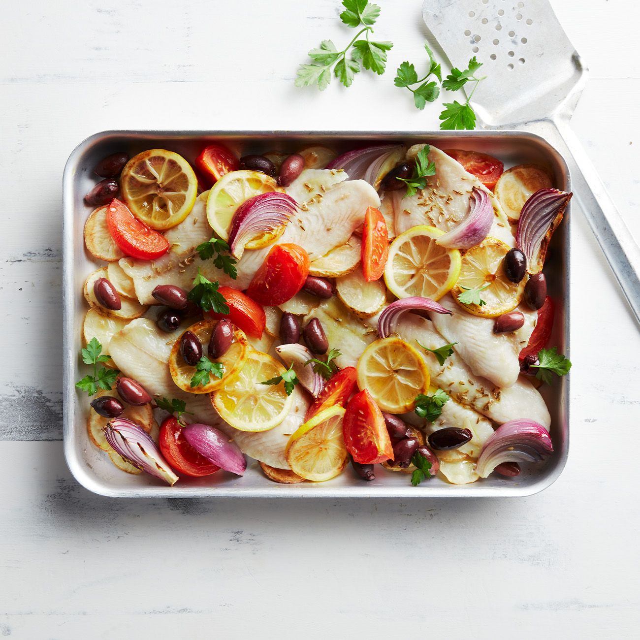 fish with tomato and olive traybake